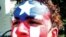 Un puertorriqueño luce la bandera de Puerto Rico pintada en su rostro en uno de los festivales boricuas en la ciudad de Orlando, Florida. 