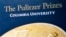Un cartel que anuncia el premio Pulitzer (AP Photo/Bebeto Matthews, File).